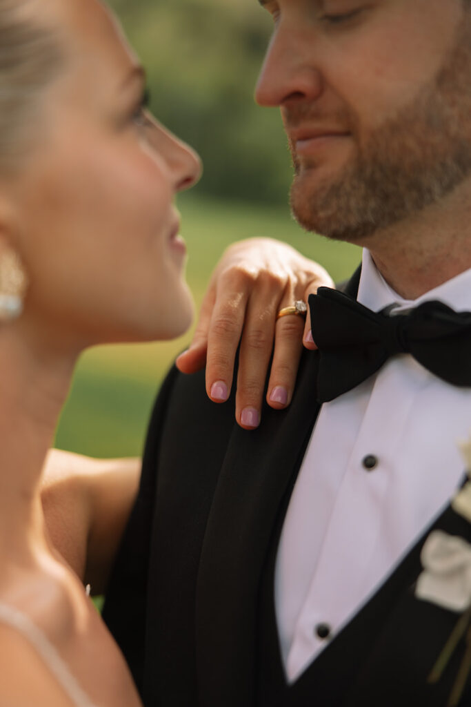 A couple celebrating their luxury western wedding with mountain views in the background.
