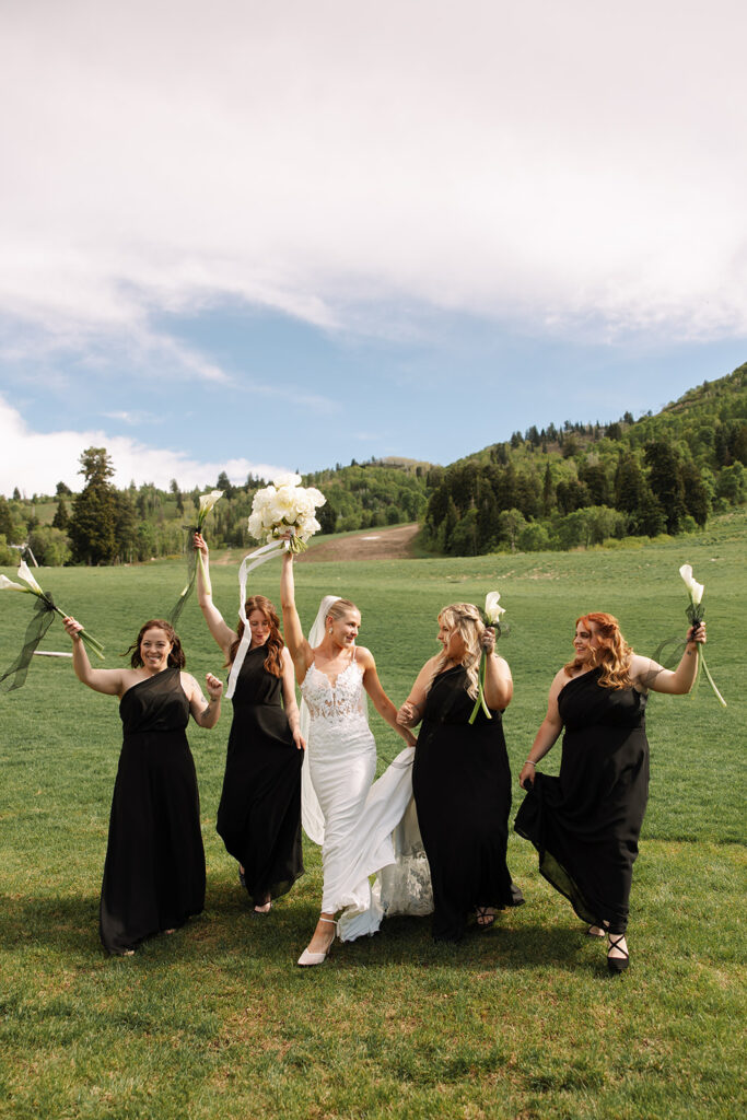 Timeless wedding moment captured in the mountains with elegant western details.