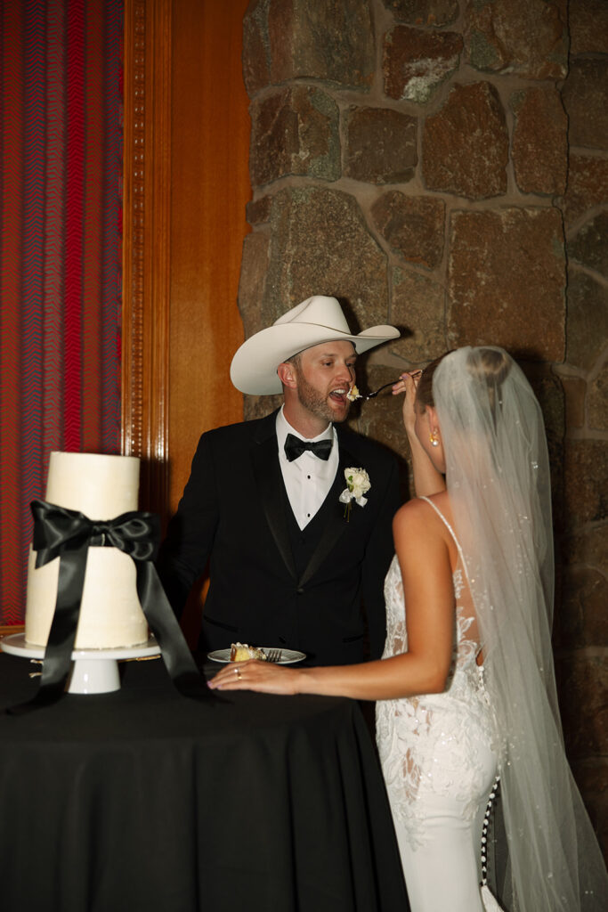 Timeless wedding moment captured in the mountains with elegant western details.
