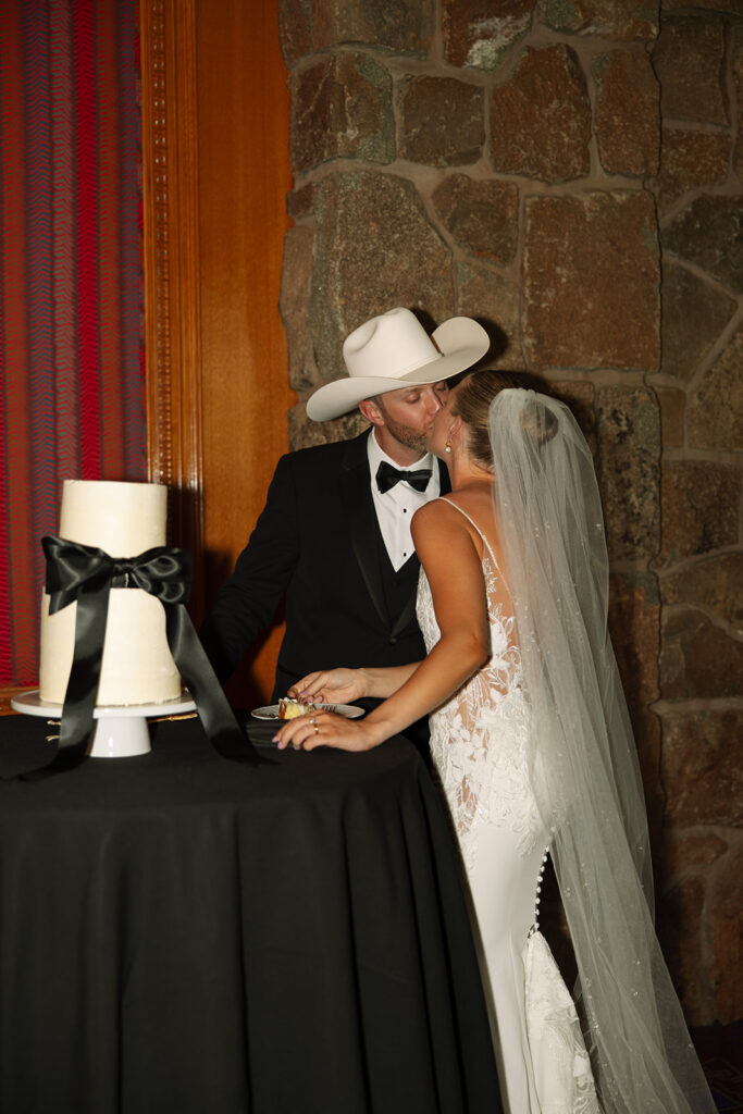 Timeless wedding moment captured in the mountains with elegant western details.
