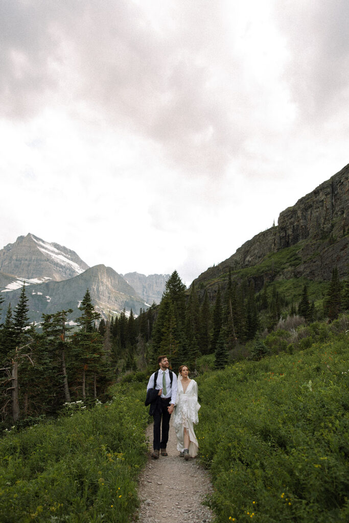 Bride and groom sharing a quiet moment during their Many Glacier elopement.
