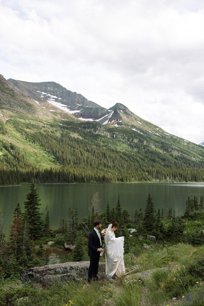 Bride and groom sharing a quiet moment during their Many Glacier elopement.