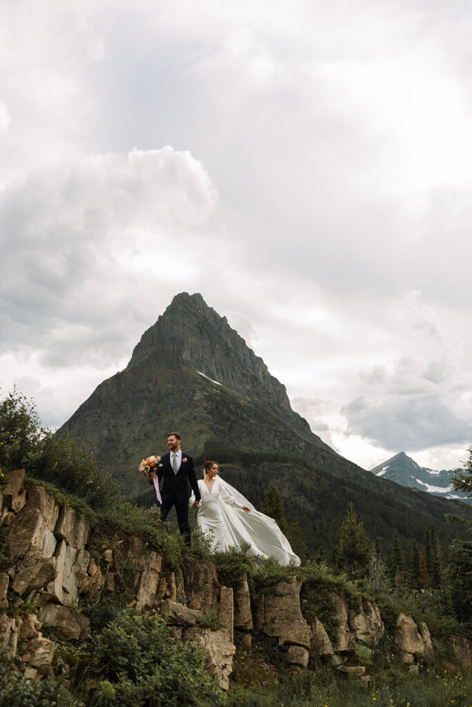 Bride and groom sharing a quiet moment during their Many Glacier elopement.
