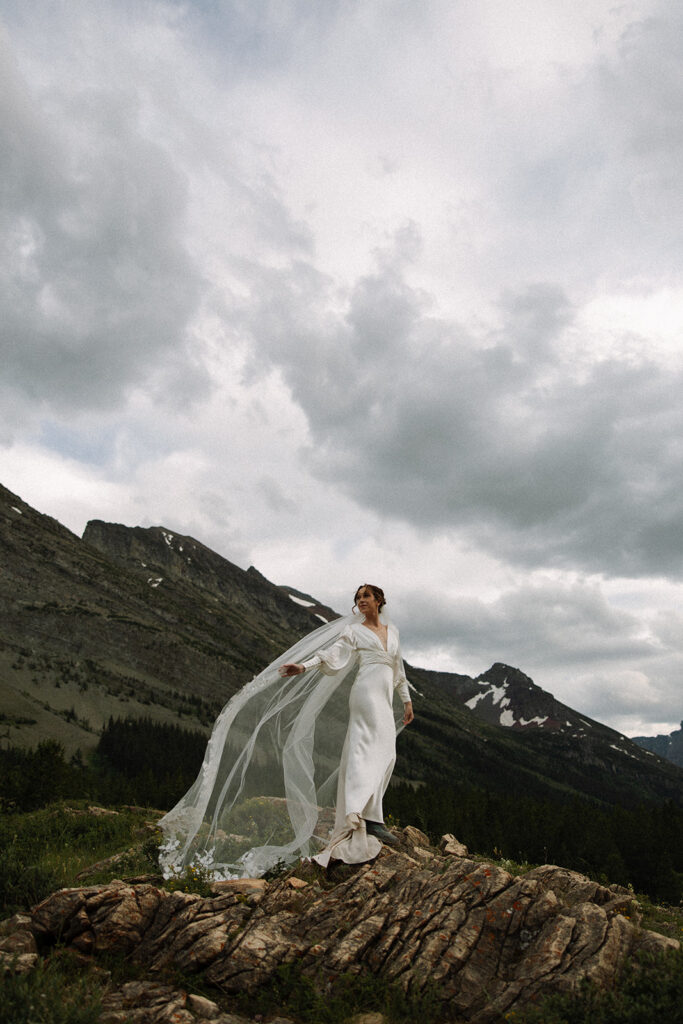 Bride and groom sharing a quiet moment during their Many Glacier elopement.
