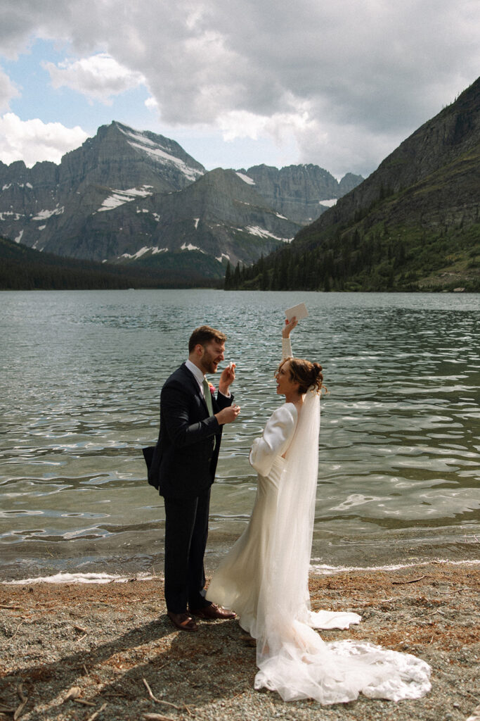 Bride and groom sharing a quiet moment during their Many Glacier elopement.
