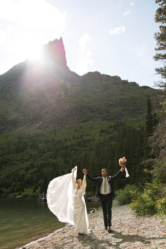 Bride and groom sharing a quiet moment during their Many Glacier elopement.
