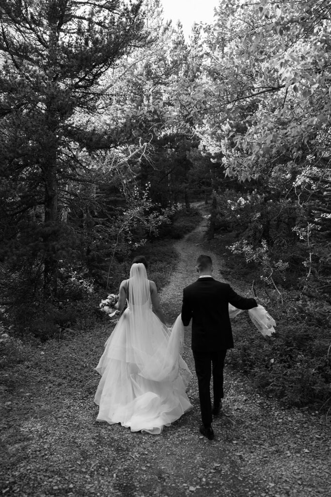 Bride and groom posing for romantic GNP elopement photos