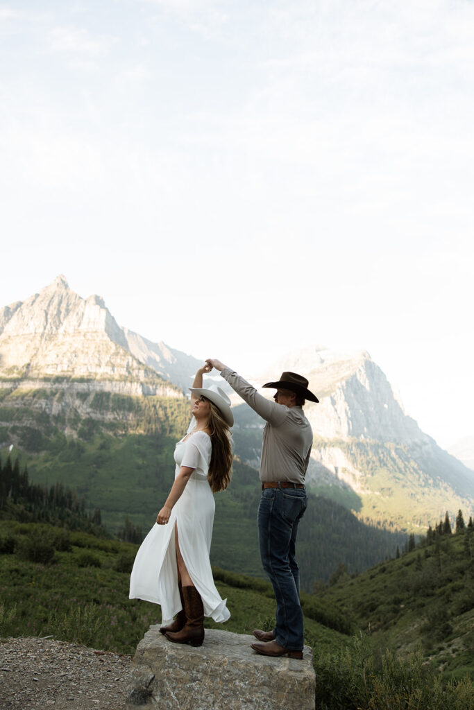 Playful engagement session with Olivia and Alex exploring the mountains at sunrise.
