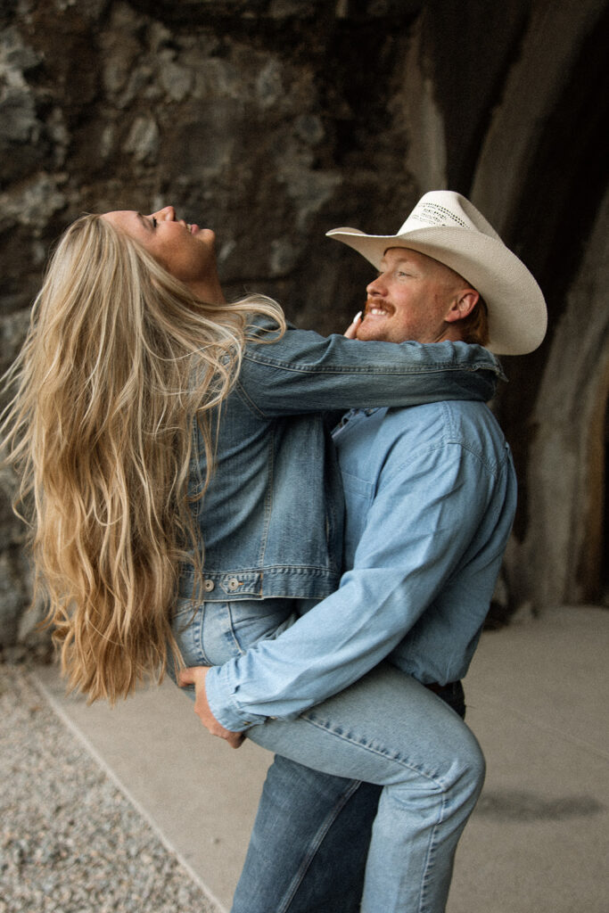 Playful engagement session with Olivia and Alex exploring the mountains at sunrise.
