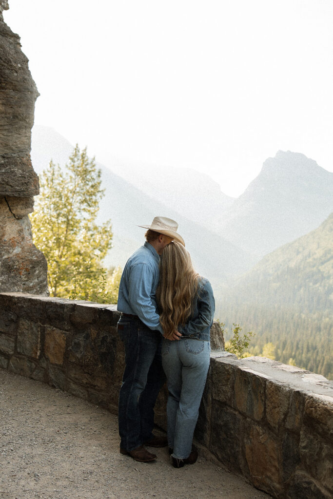 Playful engagement session with Olivia and Alex exploring the mountains at sunrise.