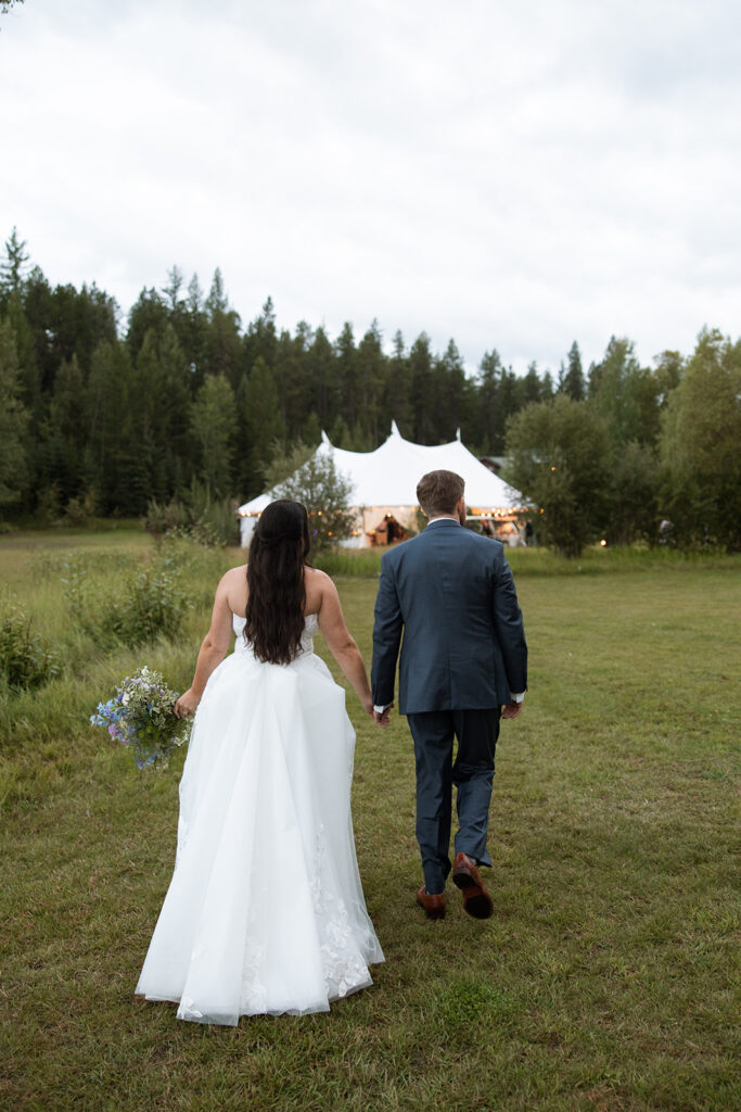 Bride and groom sharing a candid moment during their Montana wedding day