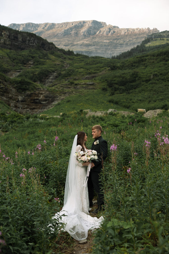 Bride and groom sharing a quiet moment outdoors
