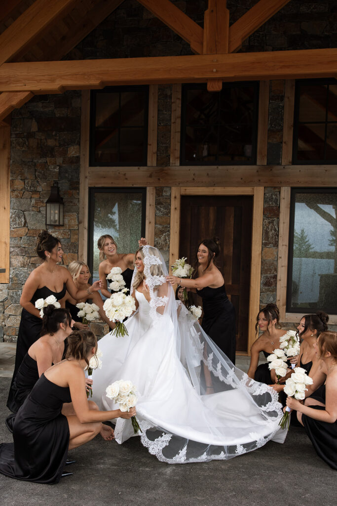 Wedding ceremony overlooking open fields and distant peaks in Montana.
