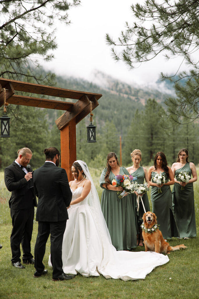 Bride and groom sharing a moment surrounded by Montana’s mountain scenery | planning a montana wedding