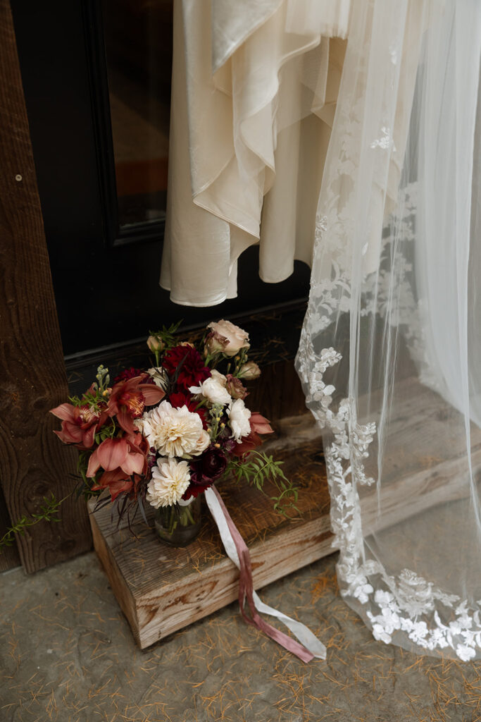 Adventurous couple celebrating their elopement in Glacier National Park surrounded by nature
