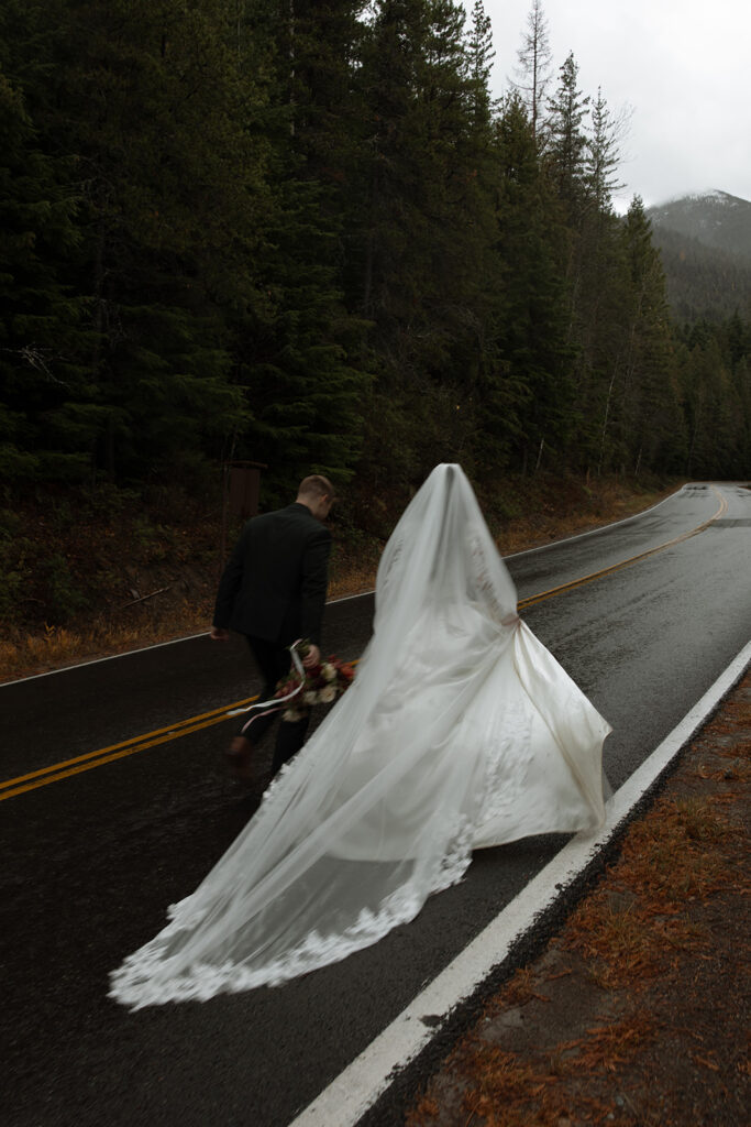 Intimate elopement ceremony by an alpine lake in Glacier National Park
