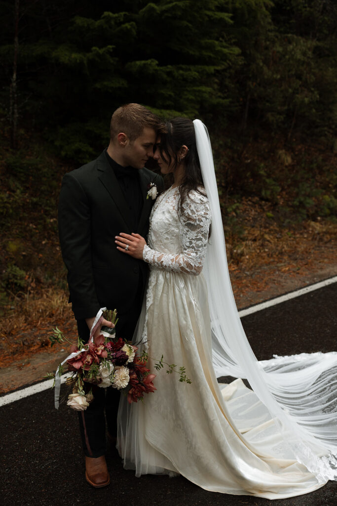 Intimate elopement ceremony by an alpine lake in Glacier National Park
