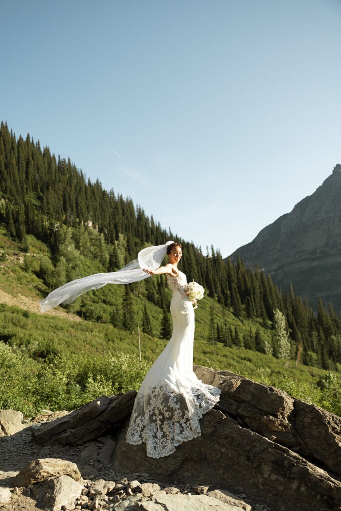 Detail shot from a Glacier National Park elopement showing layers and hiking boots, photographed by a Montana photographer in natural light.

