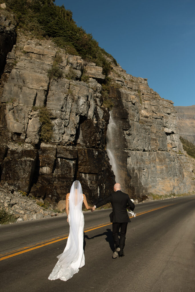 Detail shot from a Glacier National Park elopement showing layers and hiking boots, photographed by a Montana photographer in natural light.