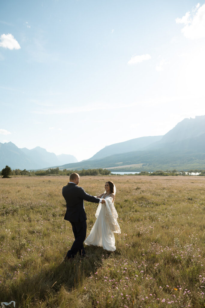 Newlyweds sharing a quiet moment together in nature after their ceremony.