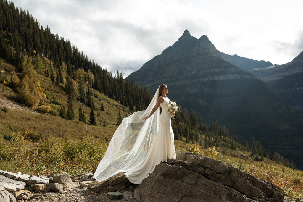 Newlyweds sharing a quiet moment together in nature after their ceremony.