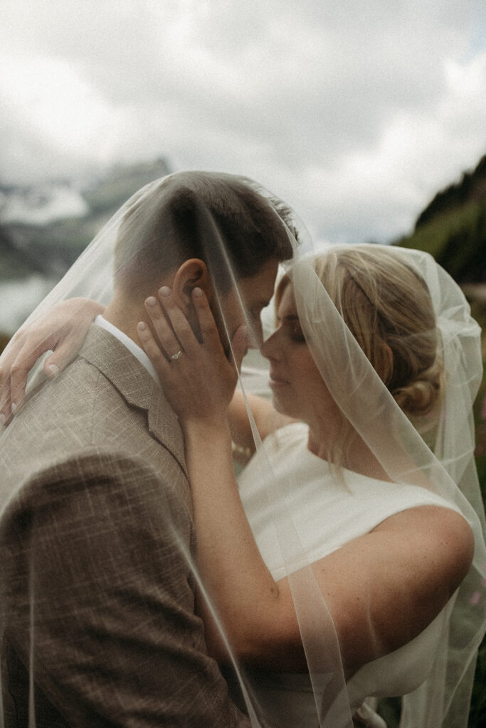 Scenic ceremony setup overlooking a lake in Glacier National Park.