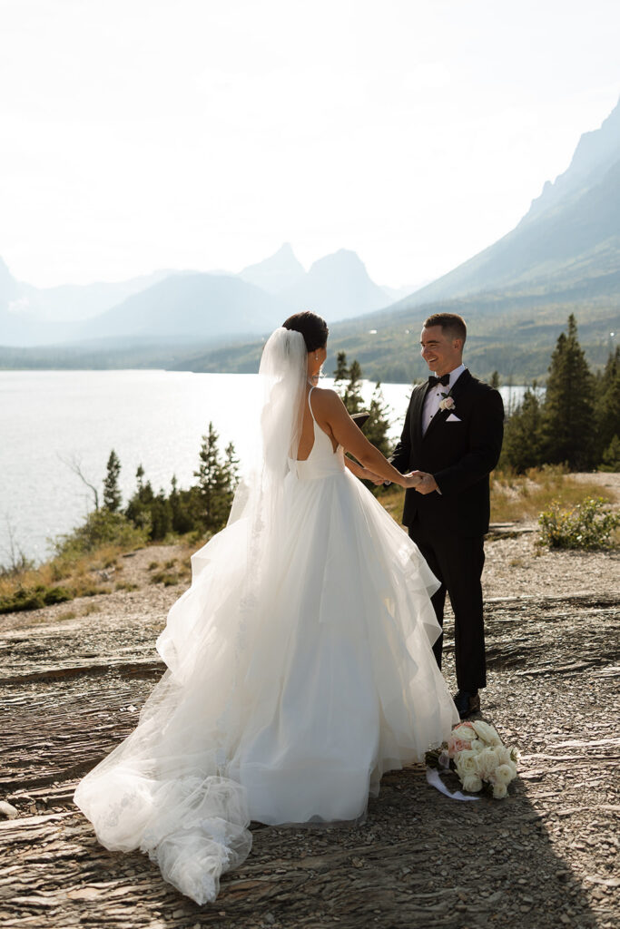 Couple standing together during an intimate mountain elopement
