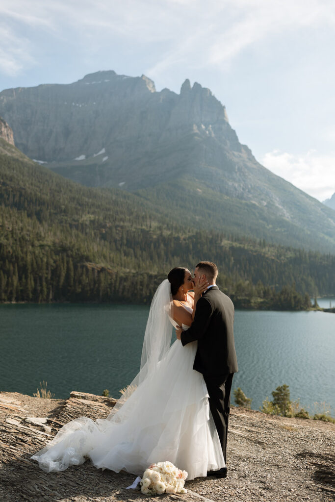 Couple standing together during an intimate mountain elopement
