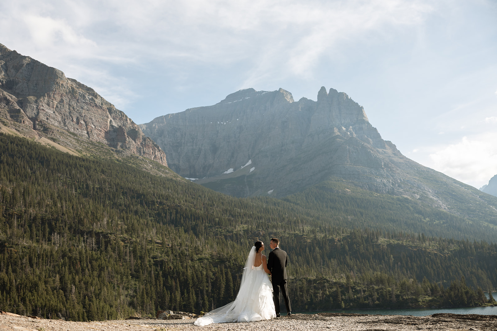 Sun Point Elopement in Glacier National Park with mountain views