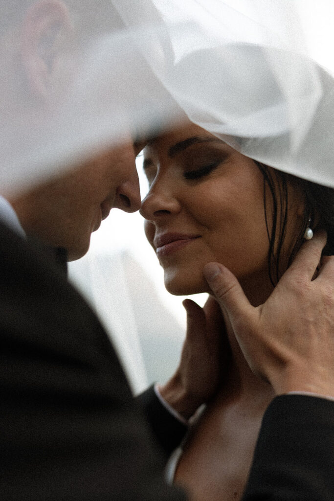 Scenic overlook with lake and mountains during sun point elopement