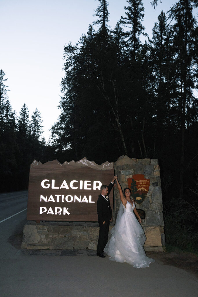 Couple embracing with expansive alpine landscape in the background | sun point elopement