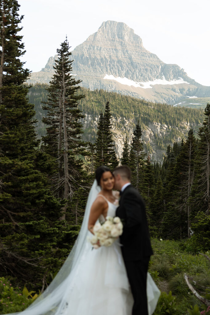 Sun Point Elopement in Glacier National Park with mountain views
