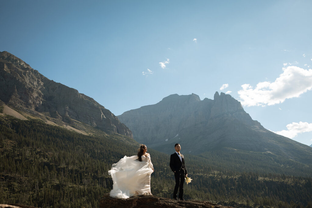 Bride and groom walking together after a sunrise elopement ceremony
