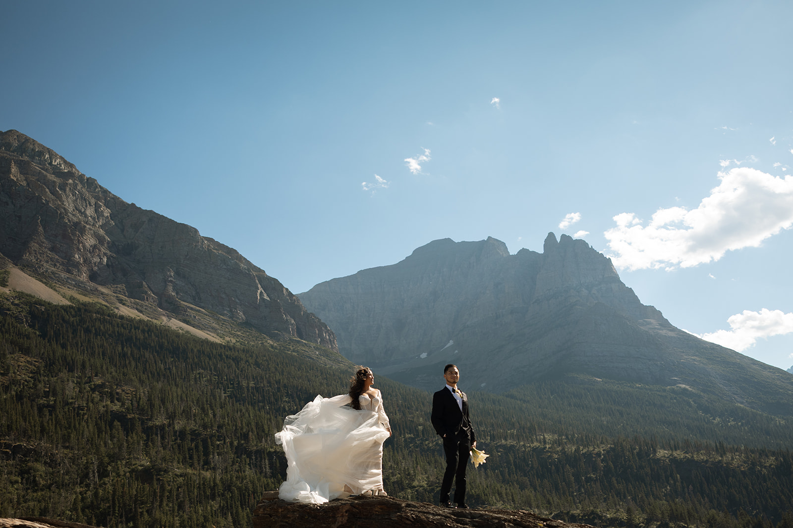 Bride and groom walking together after a sunrise elopement ceremony