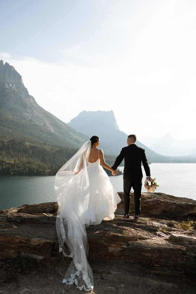 Sun Point Elopement in Glacier National Park with mountain views
