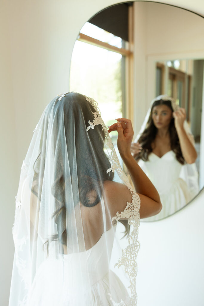Romantic wedding portraits captured in Glacier National Park with dramatic mountain scenery and peaceful lake views.